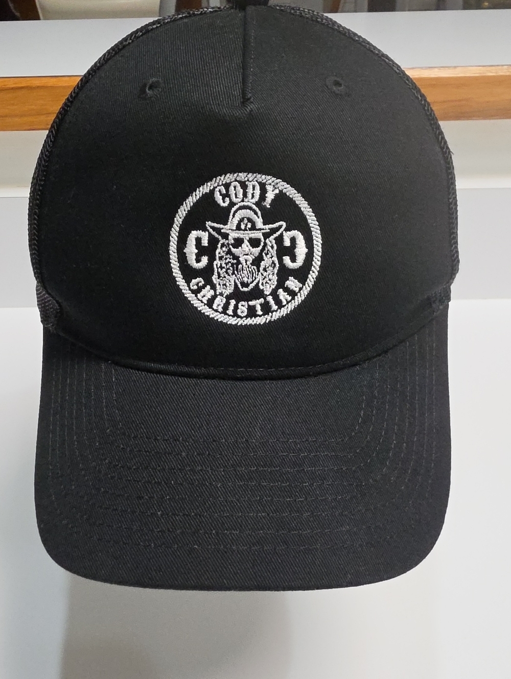 Cody Christian Merch Official "Cowboy Skull" Trucker Hat - by Port Authority